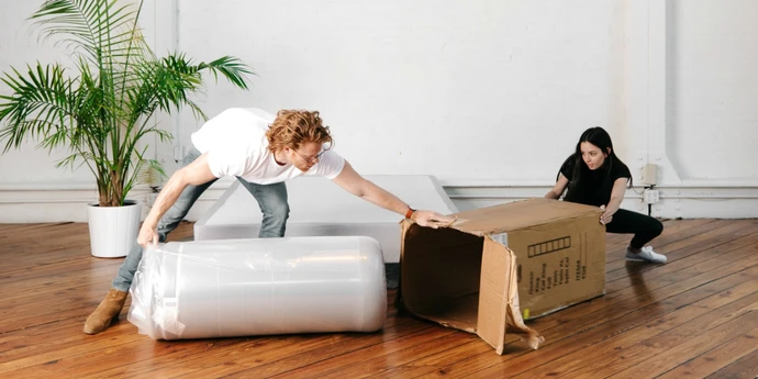 packing memory foam mattress in suitcase